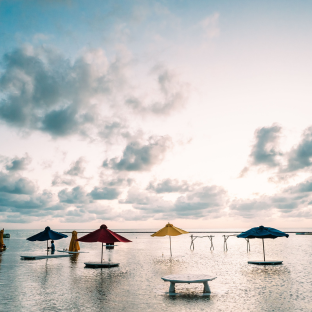 Escape to Belize’s beautiful cayes, where turquoise Caribbean waters, sandy shores, and swaying palms create the perfect island getaway.